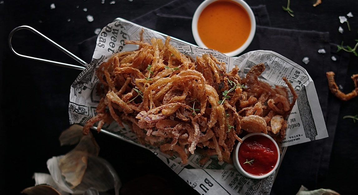 Spiced fried onion strips