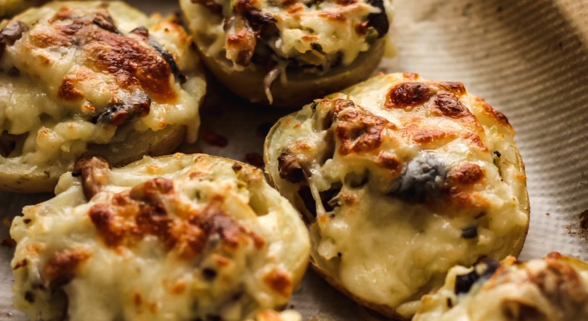 Gratin stuffed potatoes with mushrooms