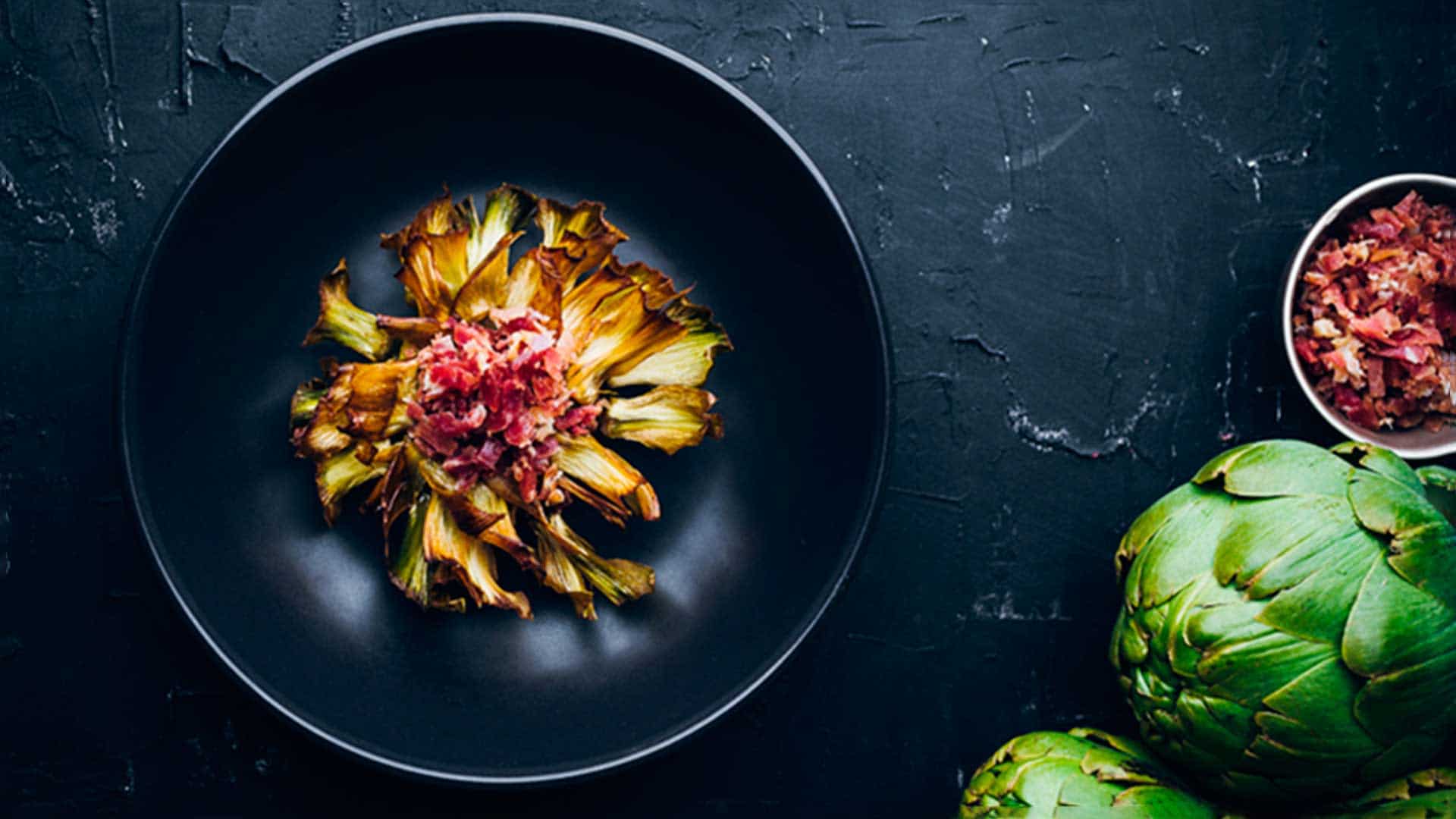 Fried artichokes with cured ham from Navarra