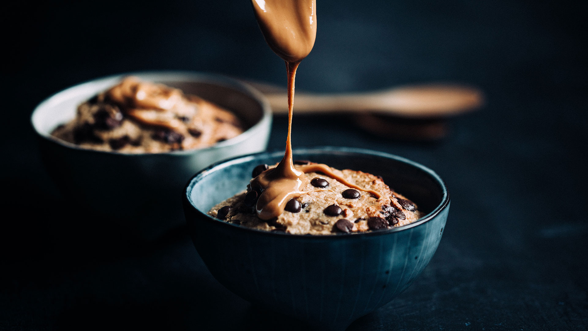 Cooked oatmeal with chocolate and peanut butter