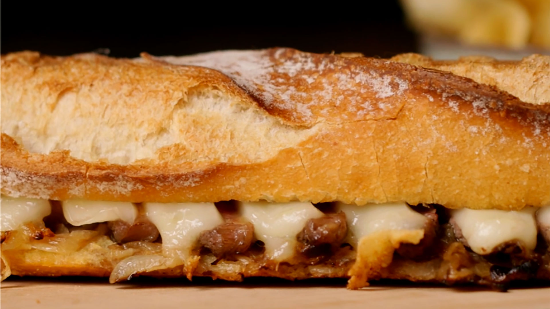Beef entrecôte, provolone, and caramelized onion sandwich 