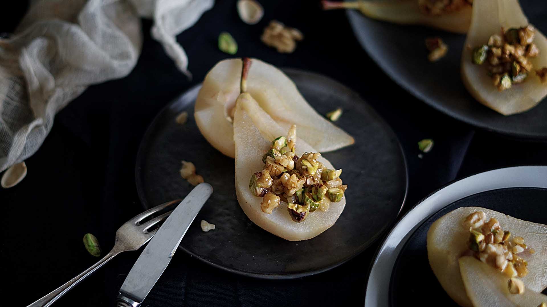 Poached pears with dried fruits and nuts