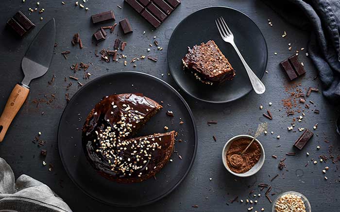 diet myths chocolate and courgette spongecake over black background
