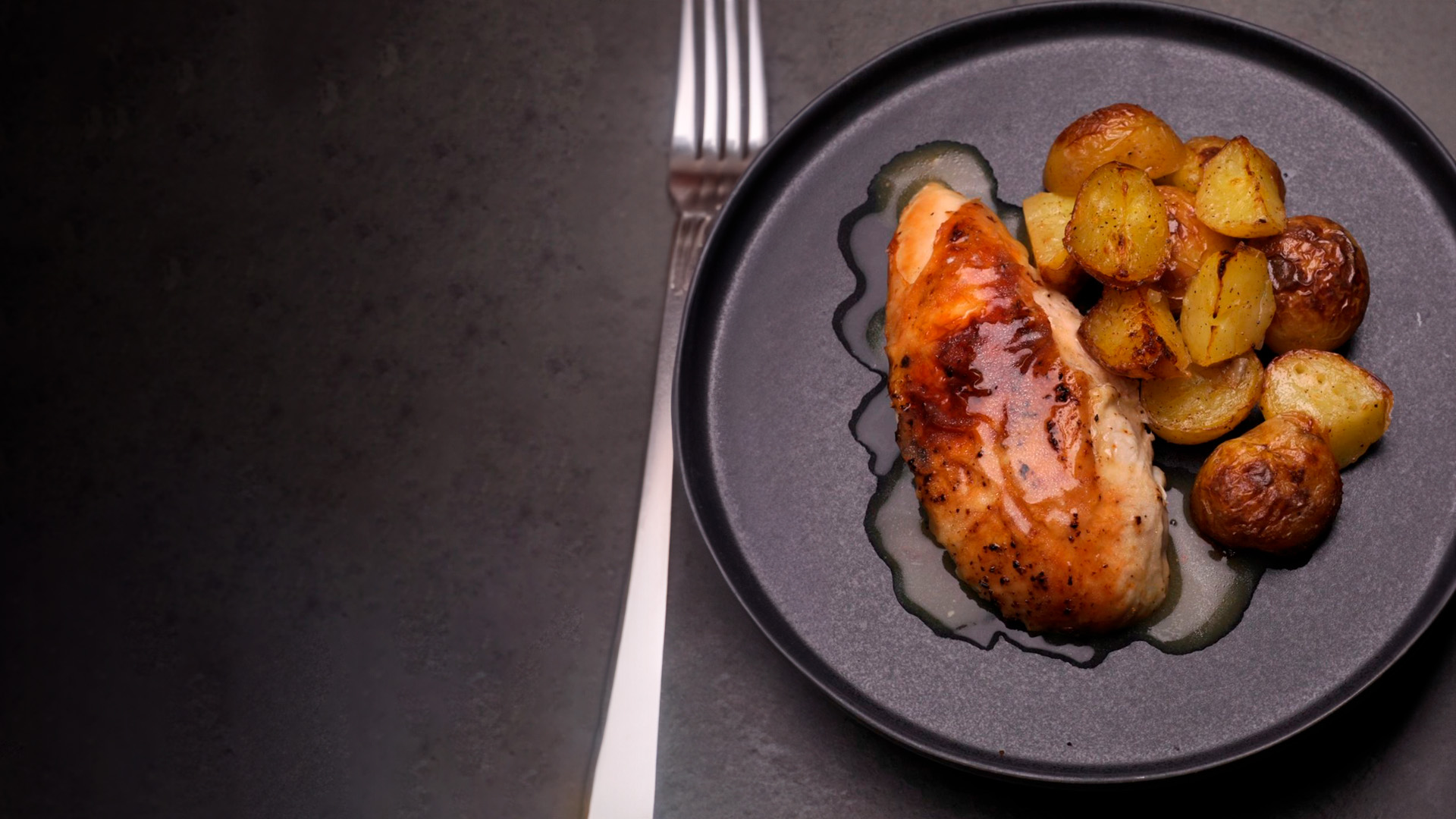 Roast chicken with crispy baby potatoes